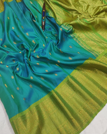 Premium Gadwal Handloom Pure Silk With Self Kanchi Border and Butta Blouse