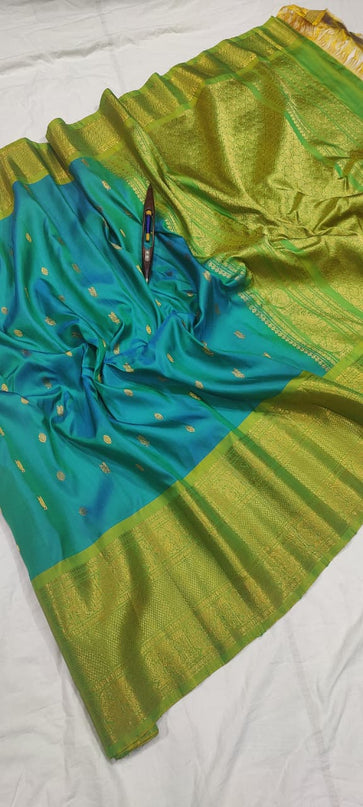 Premium Gadwal Handloom Pure Silk With Self Kanchi Border and Butta Blouse